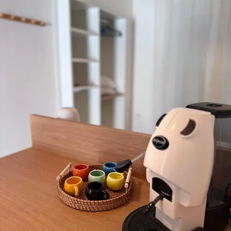 Couette-café Maison Comi *